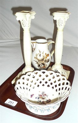 Lot 251 - Pair of creamware candlesticks, Continental jug and a porcelain pierced basket