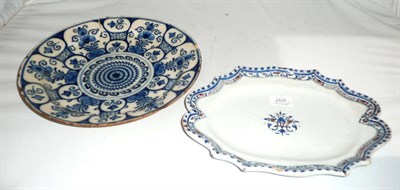 Lot 268 - French tinglaze serving plate, early 18th century L.G. (?) and an English 'Sunflower' plate,...