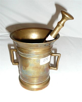 Lot 270 - A brass pestle and mortar