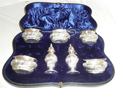 Lot 291 - Boxed set of four salts, mustard pot and two pepperettes