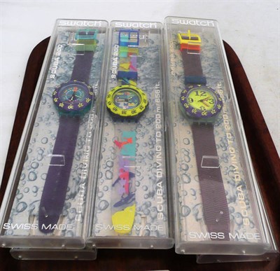 Lot 318 - Seven Swatch watches (boxed)