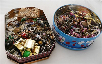 Lot 329 - A quantity of costume jewellery in a jewellery box and two tins