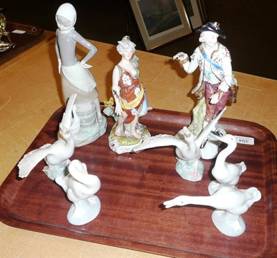 Lot 394 - Five Lladro swans/geese, a Lladro girl and two Continental figures (8)