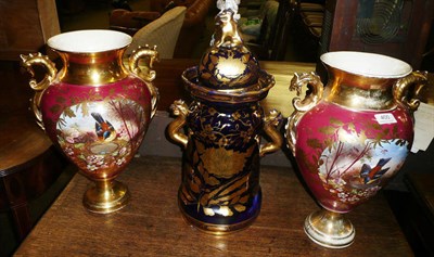 Lot 400 - Pair of Victorian gilt decorated vases and a blue and gilt Chinese design vase (unmarked)