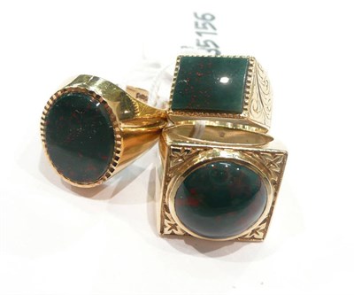 Lot 416 - Two nine carat gold bloodstone signet rings and another