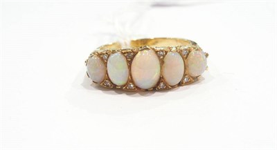 Lot 421 - An opal and diamond ring