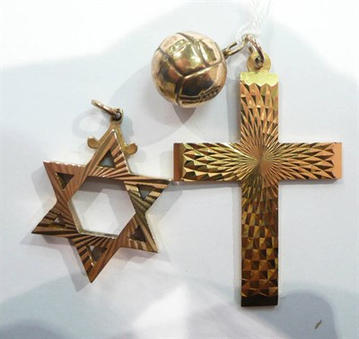 Lot 422 - A 9 carat gold Star of David pendant, a 9 carat gold cross and a football charm