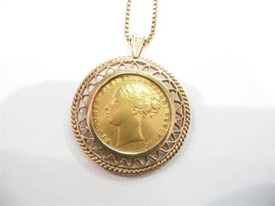 Lot 445 - An 1872 full sovereign loose mounted in a 9 carat gold pendant frame on a 9 carat gold box chain