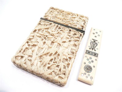 Lot 450 - Carved ivory card case (a.f.) and a steel bodkin case