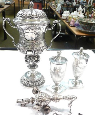 Lot 461 - A silver cup and cover, a pair of silver peppers and a silver child's rattle