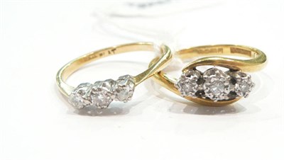 Lot 465 - Two three stone diamond rings