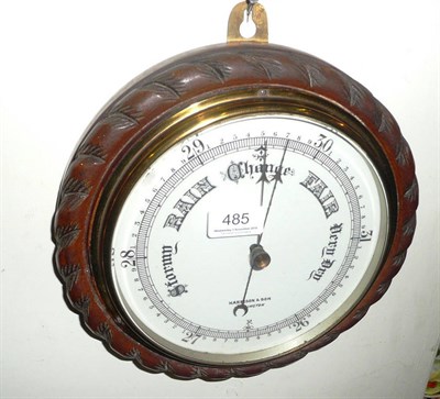 Lot 485 - A carved barometer, 'Harrison & Son, Darlington'