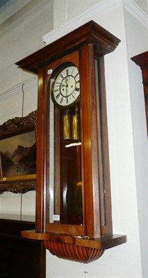 Lot 557 - A walnut wall clock by Gustav Becker