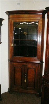 Lot 563 - Oak and mahogany standing corner cupboard with glazed upper section