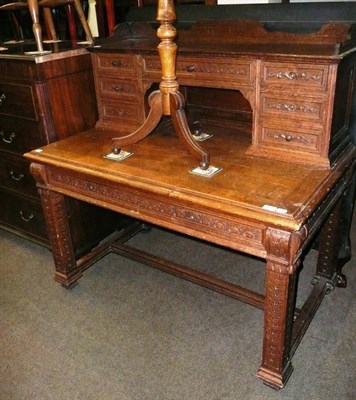 Lot 580 - Carved oak desk