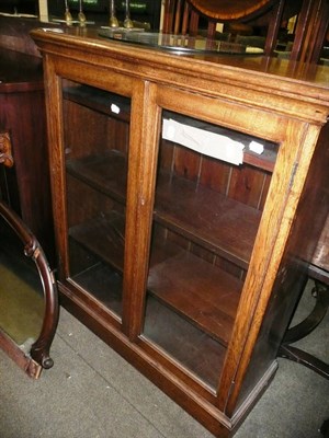 Lot 591 - Oak glazed cabinet