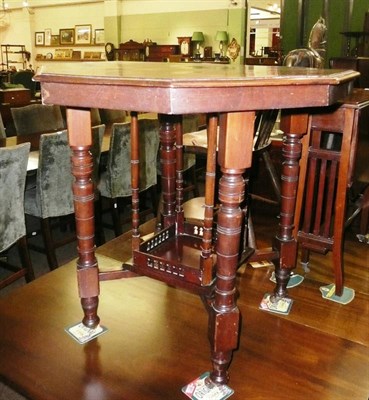 Lot 595 - A late Victorian walnut two tier centre table