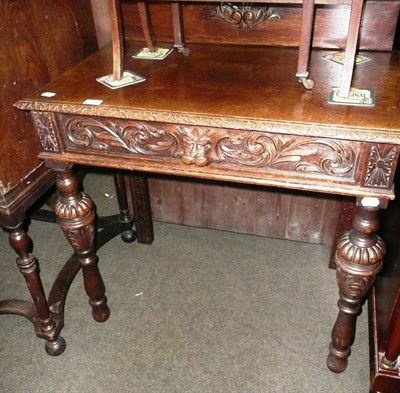 Lot 599 - Victorian carved oak hall table