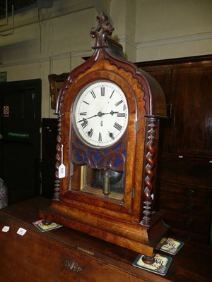 Lot 622 - A 19th century walnut mantel clock