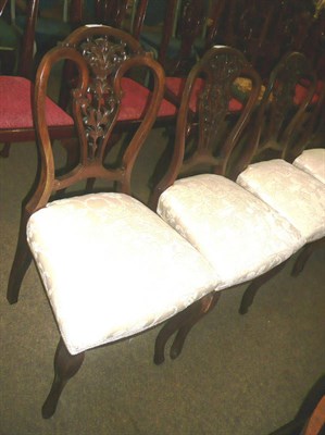 Lot 631 - Four salon chairs