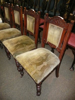 Lot 632 - A set of four Edwardian walnut dining chairs