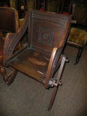 Lot 633 - A carved oak cross-frame chair and a a pair of reproduction carver chairs