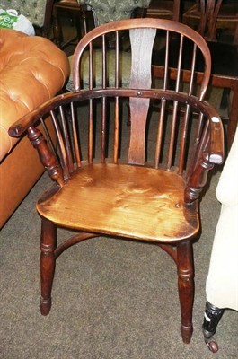 Lot 638 - 19th century yew Windsor chair