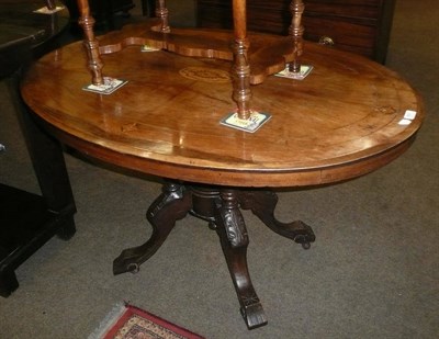 Lot 655 - A Victorian walnut oval loo table