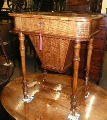 Lot 656 - Figured walnut sewing table