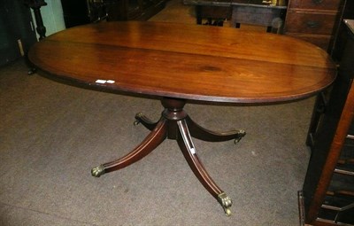 Lot 661 - Regency style mahogany oval breakfast table