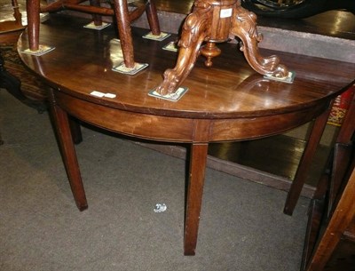 Lot 664 - Mahogany demi-lune hall table