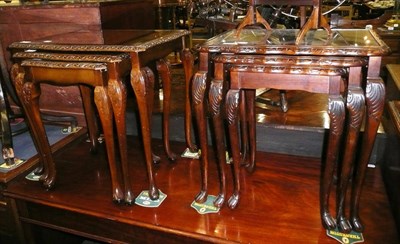 Lot 679 - Nest of walnut tables, nest of mahogany tables, cake stand and a side table