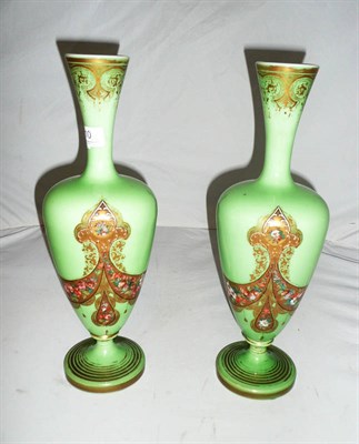 Lot 10 - Pair of green and enamel glass vases