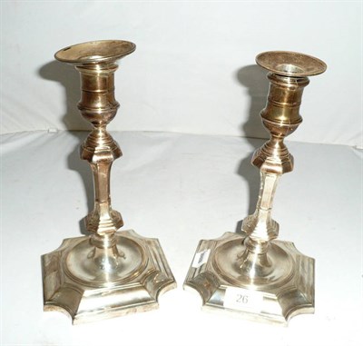 Lot 26 - Pair of silver candlesticks
