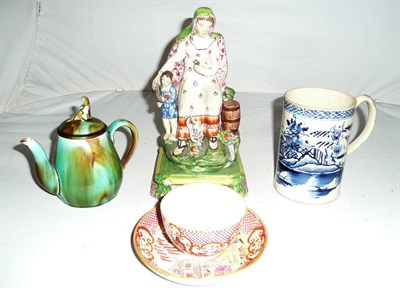 Lot 30 - Early 19th century Pratt ware figure, blue and white mug, teapot and tea bowl and saucer