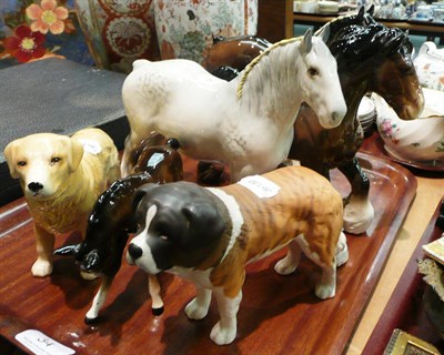 Lot 34 - Three Beswick Shire horses, a foal, a Beswick St Bernard and a pottery retriever