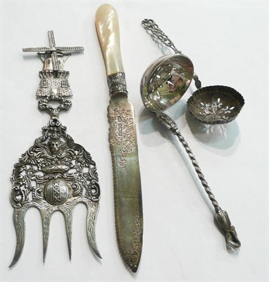 Lot 59 - Silver bread knife, Dutch windmill and two sifter spoons