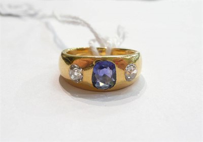 Lot 67 - A sapphire and diamond three stone ring, a cushion cut sapphire flanked by two old cut diamonds set