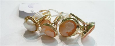 Lot 81 - A baroque pearl ring stamped '22K', two 9 carat gold cameo rings and two others