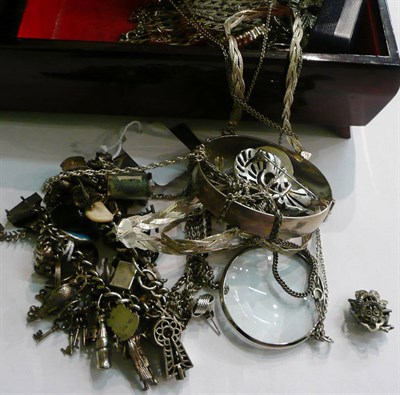 Lot 108 - A musical box with silver charm bracelet, etc