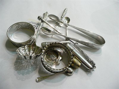 Lot 109 - Pair of silver sugar nips, two napkin rings, silver trowel bookmark, sifter spoon, two silver...