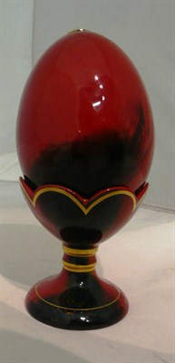 Lot 129 - Royal Doulton flambe egg on stand