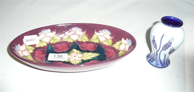 Lot 138 - A modern Moorcroft collectors club oval dish and a modern Moorcroft miniature vase