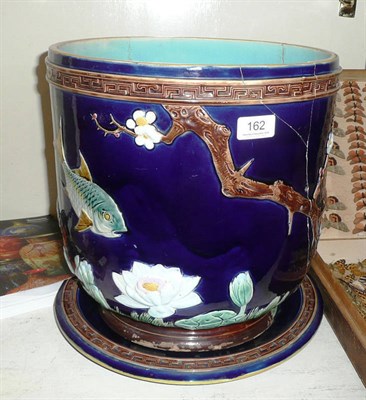 Lot 162 - A Joseph Holdcroft Majolica jardiniere and stand (a.f.)