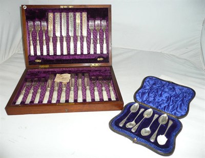 Lot 206 - Cased silver teaspoons and a plated fruit service, boxed