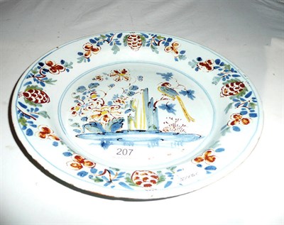 Lot 207 - A Liverpool polychrome delft shallow dish