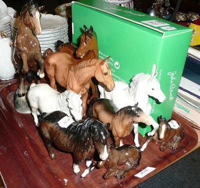 Lot 208 - Two Royal Doulton horses, a Beswick rearing Welsh cob, four Beswick ponies and three foals