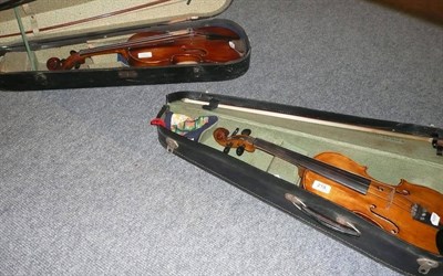 Lot 218 - Two cased violins, one labelled Maidstone, the other Stradivarius