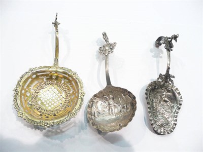 Lot 235 - Three Dutch sifter spoons