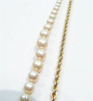 Lot 241 - A 9 carat gold necklace and a strand of graduated cultured pearls